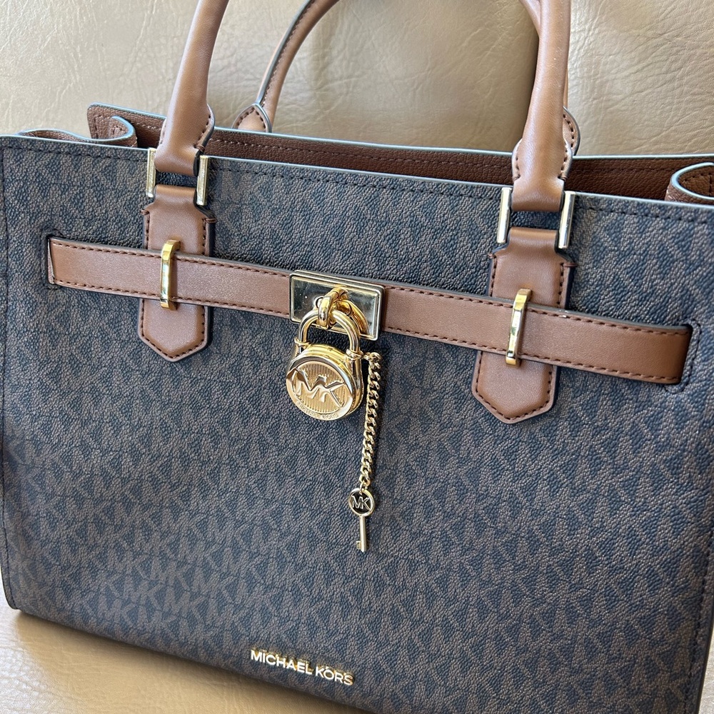 Genuine Michael Kors bag. With long strap